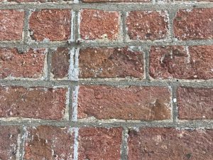 damage to bricks caused by sandblasting